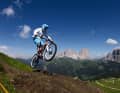 Beautiful flying in the Bikepark Belvedere in front of the Sella massif.