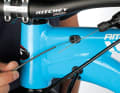 3. a liner is now slid over the cable remaining inside the frame. This then serves as a guide for laying the new cable. The old cable can now be pulled out. Then thread the new shift cable through the shift lever, the end cap of the outer casing, the outer casing and then through the liner inside the frame.
