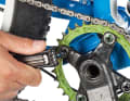 The chainring and the sprocket set can also be responsible for cracking noises when pedalling. Make sure that all bolts on the chainring are tightened evenly. If in doubt, use a torque spanner. Use the chain whip to check whether the locking ring of the sprocket set is tightened.