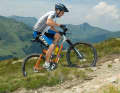 SITTING

RIGHT

Centre of gravity forwards: To prevent the front wheel from rising on steep sections and to keep the bike manoeuvrable, the body's centre of gravity must be forward. Stefan slides forwards on the saddle and bends his arms to reduce the distance between his shoulders and the handlebars. Important: an even flow of power, i.e. a round pedal stroke.