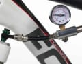 1. HARDNESS

Before you turn your attention to the damping, you must adjust the fork and shock to your body weight. Depending on the model, you can change the air pressure (pictured) or the spring preload.