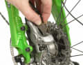 1. first remove the brake pads. The pads are usually secured with a split pin or a small screw. So first remove the split pin or screw, then pull the pads backwards out of the brake calliper. With most brakes, you do not even have to remove the wheel to do this. 2. if the pads have to be removed from the caliper inwards - i.e. towards the hub - the wheel and brake disc must be removed first. This means opening the quick release/threaded axle and removing the complete wheel from the frame or fork. 