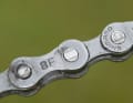 CHAIN BREAKED

A chain always breaks at the point where it is badly riveted. If a chain link looks like the one in the picture, remove it. You can also ride with a chain that has been shortened by two links without any problems. The gear selection on the large chainring may be restricted.