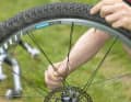 BROKEN SPOKE

The consequence of a broken spoke is a heavy knock in the wheel. Centre the wheel provisionally as described on page 10. Wrap the broken spoke around its neighbours.