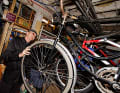 Gary loves old bikes. In the basement of the American Cyclery, the oldest bike shop in the city.