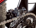 Shift to the large chainring and smallest sprocket. Now adjust the outer limit of the derailleur with the H-screw. The chain should be at a minimum distance from the outer guide plate.