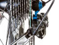 Firstly, check that the derailleur hanger is straight. The derailleur cage should run exactly in line under the sprocket. A bent derailleur hanger is best repaired by a specialist dealer.