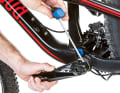 Start on the left-hand side of the crank by opening the Allen screws. You do not need to unscrew them completely from the crank.