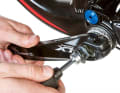To unscrew the locking screw from the axle, you need a so-called crank cap tool. This can be purchased for around 1.50 euros.