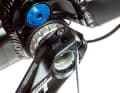 Then use a small screwdriver to lift the locking plate located between the two Allen screws.