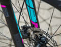 A Rock Shox Recon fork in a matching design is fitted.