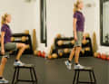 Box climber

 Stand with one leg on a stool or chair. Keep your body upright and fixate on a point straight ahead of you. The leg bend should be 90 degrees when bent. Tighten your abdomen. Now push yourself up until your leg is almost straight. Return in the same movement and switch legs.

Pay attention to this: The knee is in line with the toes. When climbing up, make sure that the knee does not bend to the side. The body's centre of gravity is on the leg to be loaded. Do not tilt to one side when descending.

Duration: 2 series each with the left and right leg, 10 repetitions per leg. Series break: 30 seconds.