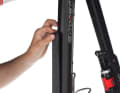 Test the position of the sticker: It should be applied with the lower edge directly in front of the weld seam on the bottom bracket. Place the film on the bottom bracket and apply it evenly towards the head tube. Positioned correctly? Then rub it down with a thick cloth.