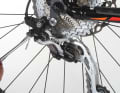4. last step: adjust the chain wrap. To do this, turn the screw shown (directly on the derailleur hanger) until the upper derailleur pulley is as close as possible to the sprockets (approx. 5-7 millimetres for Shimano, see manufacturer's instructions).