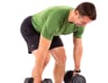 WHEELING

 1. pick up the dumbbells and tilt your upper body forwards. The spine remains straight, the knees are slightly bent and the stance is shoulder-width apart.

  