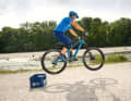 Bunny hop - 4: Ideally, you will have made it over the obstacle. If you get stuck with the rear wheel, it's because your hip swing to the stem is too weak or your timing is wrong. Ideally, you should land with both tyres at the same time.