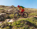Bend: Now it's time to prepare for the jump by creating tension. To do this, bend your legs and arms. Just before you hit the stone field, you have to push off.