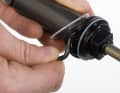 Remove the seals: Remove the two white plastic rings above and below the air chamber seal on the damper. A pointed tool is a useful aid. Take great care not to scratch the seat of the seal. Remove the seal.