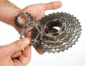 1. dismantle cassette, replace sprocket

 Attach the chain whip and the cassette remover to the cassette and loosen the cassette end ring. You can then remove the cassette from the freewheel. Now remove the 17 mm sprocket and the corresponding spacer ring. With some sprocket sets, you also have the option of removing the 15 mm sprocket.