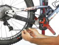 SUPER DAN'S TIP:
 If the rear derailleur still has problems shifting the largest sprocket, check the chain length. For double drivetrains, place the chain on the large chainring and the largest sprocket and add two chain links. With single drivetrains, the derailleur cage should not be fully tensioned on the large sprocket, but should have some play at the top.