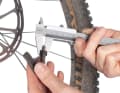 5. saturated pad Wet and muddy conditions eat away at brake pads and discs in fast motion. Check both for the minimum thickness required by the manufacturer.