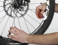 Tighten the spokes If the spoke tension in the wheel is very low, it helps to tighten all the spokes by half a turn. Then centre them.