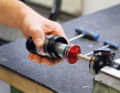 3. pull off the housing Carefully pull the damper sleeve backwards until the remaining air escapes from the negative chamber. Then clamp the damper in a vice to remove the housing completely. Use a lint-free cloth to remove the old grease from around the damper piston.