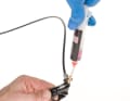Pull the syringe (negative pressure) and press the button. Then push back the lever with pressure on the syringe. Repeat eight times. Then turn the speed control setting in with negative pressure in the syringe. Then press out on the syringe. Repeat four times. Unscrew the syringe at the slowest setting.