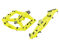 HT ME03t Evo Mag

www.shocker-distribution.com

 Price: 129 Euro - Weight*: 273 gram -

 Dimensions: 96x102x11 mm

 Wow, only eleven millimetres! That makes the HT pedals thinner than the topping on my sandwich and, at 273 grams, also extremely light. The magnesium body makes it possible. Ten aluminium pins on each side wedge into the sole of the shoe like teeth in a bread roll. However, they can sometimes fall out on contact with the ground. However, this rarely happens as the flat design guarantees plenty of ground clearance. The running of the large pedal body can be adjusted using the lock nut on the axle. With a titanium axle, the HT would weigh 220 grams.

Conclusion: flat, light, grippy - you can hardly expect much more from a pedal.

Grip 5 out of 6 points

Footprint 6 out of 6 points