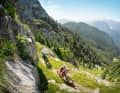 The Carnic Alps rise up like a wall in front of the Italian border. The former war trails are creatively carved into the rock.