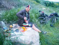 Walter Lauter uncorks a bottle of Chianti at sunset.