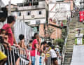 Downhill: Long, steep stairs, plus plenty of air time - the downhill races through the favelas offer spectacular routes.