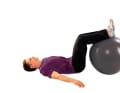 Bridge with Pezzi ball: 1. place your feet on the ball, upper and lower legs at a 90 degree angle. Rest your upper body and head on the floor. Arms slightly apart next to you, back of hands facing upwards.