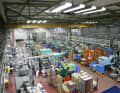 Thick air: 45 injection moulding machines heat the air to Caribbean temperatures at the plastics plant in Hülben. Not only brake levers, brake cylinders and HS33 brake pads are produced here, but also parts for the motorbike sector and other industrial sectors. Incidentally, the employees are not exactly on their lunch break; a large part of the production here is fully automated.