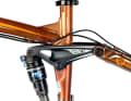 Alternatively, if you don't want to drill holes in your frame, you can also drill out a bottle cage eyelet and use the existing hole as a cable entry.