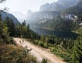 Biking above Lake Gosau with a view of the Dachstein.