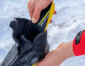 Check the insoles: Can they be easily removed for drying and put back in again? Are they thick enough to keep the cold out (especially over the steel cleat)? Do better insulating retrofit soles still fit in the shoe?