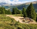 On the Carosello flow mountain, bikers surf smoothly from one line to the next.
