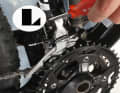 2. now set the left stop of the front derailleur. Shift to the smallest chainring at the front and the largest sprocket at the rear. Turn screw L until the inner guide plate of the front derailleur is about one millimetre away from the chain. Now adjust the tension so that the front derailleur moves the chain smoothly into all positions when shifting.