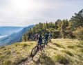 Trail bikes are light enough to ride across the Alps, and you can even tackle challenging descents on them. How much of an all-rounder can you expect for 4000 euros?
