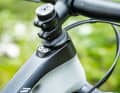 Canyon Neuron CF 9 SL | Meister in detail: A steering stop limiter protects the frame from damage in the event of a crash. A cable channel on the down tube facilitates cable routing.