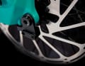 The minimalist kickstand mount is simply placed between the thru axle and the frame. It's hardly noticeable, but if you need it, you'll find it here.