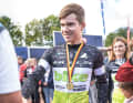Shake hands and proudly wear the medal.