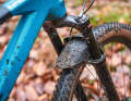 The dainty mini mudguard on the fork catches the worst of the dirt on muddy trails. 