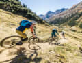 Despite high downhill competence, all-mountain bikes should also be suitable for touring.