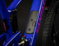 The storage compartment in the down tube is located under the bottle cage mount. 
