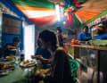 A quick lunch in a café at the bus station in the border town of Butare.  