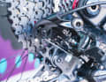 Similar to Sram, the shift cable is deflected via a pulley 