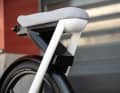Thanks to the bench seat instead of a saddle, the bike is designed to suit a wide range of riders, even though it’s a one-size-fits-all model. Hidden in the compartment under the seat is an ultra-powerful fast charger.