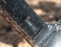 The battery indicator in the carbon casing of the 375 battery.